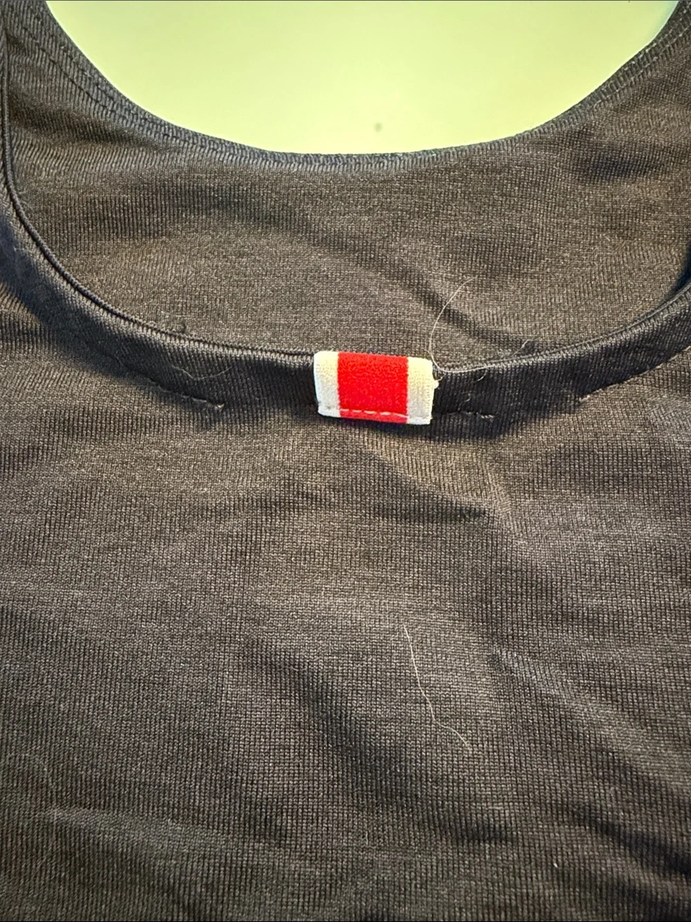 Tracksmith black scoop